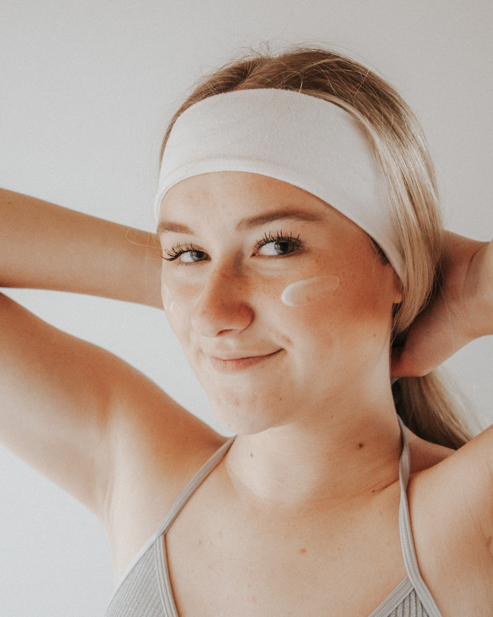 a woman doing her skincare.