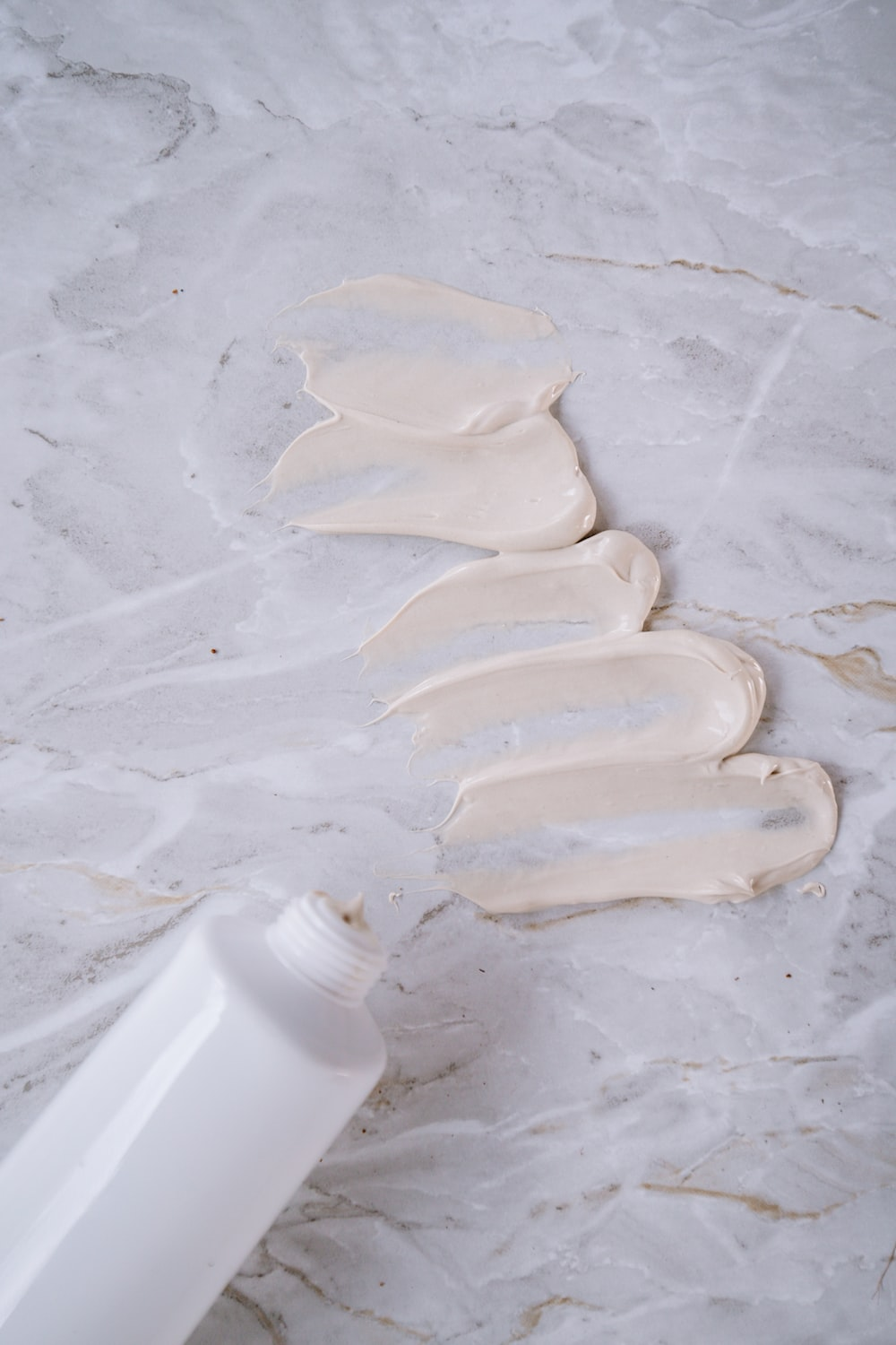 a white tube of sunscreen