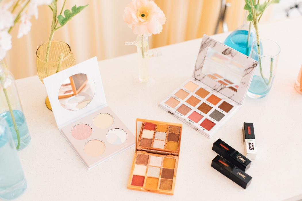 Eye shadow palettes on a table