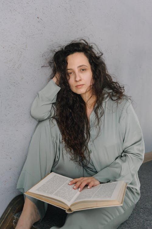 A woman with messy hair