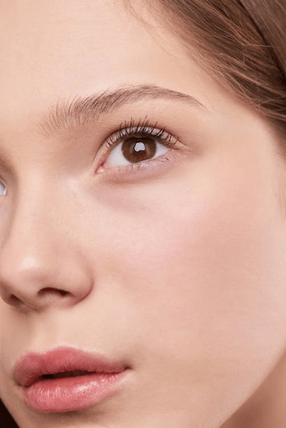 Close up of a woman’s face and clear skin